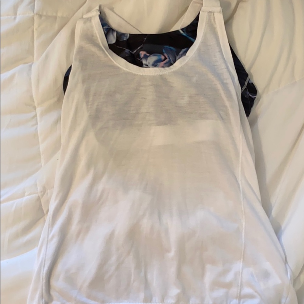 white athletic top with a built in sports bra